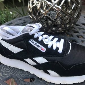 Black Reebok Classic Sneakers with white detail.